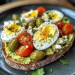 Mediterranean Egg & Avocado Toast with Feta, Olives & Tomatoes